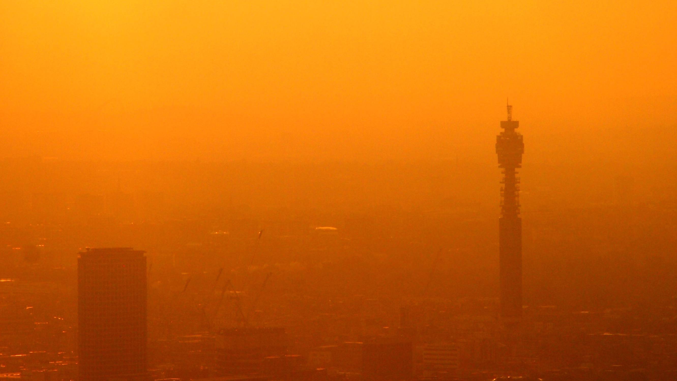 Smog covers London skyline at sunset. Photo 68992684 © Michael Sheridan _ Dreamstime.com